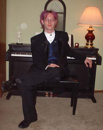 Andy Black, the world renowned concert pianist preps himself for the big show.  CLICK FOR MORE!